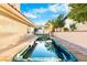 Relaxing hot tub with wooden deck and backyard views at 7944 Marbella Cir, Las Vegas, NV 89128