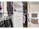 Walk-in closet with ample shelving and hanging space at 7961 Terrace Rock Way # 202, Las Vegas, NV 89128