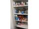 Well-stocked pantry with ample shelving at 7961 Terrace Rock Way # 202, Las Vegas, NV 89128