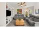 Relaxing living room showcasing built-in shelving and comfortable seating at 830 Carnegie St # 1821, Henderson, NV 89052