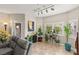 Relaxing living room with tile flooring, natural light, and comfortable seating area at 830 Carnegie St # 1821, Henderson, NV 89052