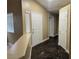 Inviting entryway with dark tile flooring at 9712 Tiaquinn Ave # 101, Las Vegas, NV 89129