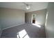 Spacious bedroom featuring carpeted floors, bright light, and neutral-colored walls at 1025 Chestnut Bay Ave, North Las Vegas, NV 89031
