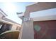 Close-up of the house number '1025' on the exterior wall, next to a garage door at 1025 Chestnut Bay Ave, North Las Vegas, NV 89031