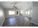Bright living room showcases open layout, natural light, and ceiling fan at 1025 Chestnut Bay Ave, North Las Vegas, NV 89031