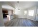 Living room view leading to the kitchen with an open floor plan at 1025 Chestnut Bay Ave, North Las Vegas, NV 89031