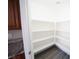 Walk-in pantry with ample shelving for storage at 1025 Chestnut Bay Ave, North Las Vegas, NV 89031