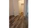 Bedroom with spacious closet and wood-look floors at 10337 Adams Chase St, Las Vegas, NV 89183