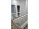 Upstairs hallway with wood-look floors at 10337 Adams Chase St, Las Vegas, NV 89183