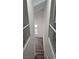Bright staircase showcasing the modern wood flooring and vaulted ceilings at 10337 Adams Chase St, Las Vegas, NV 89183