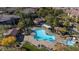 Bird's eye view of community pools, lush green trees and manicured grounds at 11870 Tevare Ln # 2086, Las Vegas, NV 89138