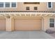 Attached two car garage with neutral earth tone colors, perfect for luxury living at 11870 Tevare Ln # 2086, Las Vegas, NV 89138