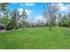 Expansive green space with mature trees, providing a serene and picturesque setting for residents at 11870 Tevare Ln # 2086, Las Vegas, NV 89138