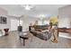 An inviting living room that is the heart of luxury and comfort, with an open floor plan to the kitchen at 11870 Tevare Ln # 2086, Las Vegas, NV 89138
