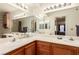 Double vanity bathroom with a large mirror and good lighting at 1575 W Warm Springs Rd # 1113, Henderson, NV 89014