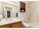 Clean bathroom with a single vanity and shower/tub combo at 1575 W Warm Springs Rd # 1113, Henderson, NV 89014