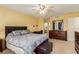 Bright bedroom with a king-size bed and en-suite bathroom at 1575 W Warm Springs Rd # 1113, Henderson, NV 89014