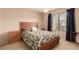 Charming bedroom with a queen-size bed and window at 1575 W Warm Springs Rd # 1113, Henderson, NV 89014