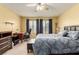 Comfortable bedroom with a king-size bed and ample natural light at 1575 W Warm Springs Rd # 1113, Henderson, NV 89014