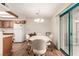 Small dining area with table and chairs near kitchen at 1575 W Warm Springs Rd # 1113, Henderson, NV 89014