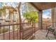 Relaxing patio with seating area and metal shelving unit, overlooking a courtyard at 1575 W Warm Springs Rd # 1113, Henderson, NV 89014