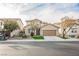 Two-story house with tan exterior and garage at 189 Carneros Ave, Henderson, NV 89002