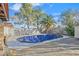 Relaxing pool with covered patio and storage shed at 2227 Heavenly View Dr, Henderson, NV 89014