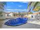 Covered pool in backyard with storage shed at 2227 Heavenly View Dr, Henderson, NV 89014