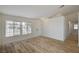 Living room with hardwood floors, neutral walls, and ample natural light at 2920 Saddle Hills Ct, North Las Vegas, NV 89031