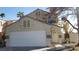 Two-story house with attached garage and landscaping at 346 Pinnacle Ct, Henderson, NV 89014