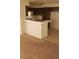 Galley kitchen with dark brown cabinets and white appliances at 346 Pinnacle Ct, Henderson, NV 89014