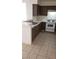 View of kitchen with double sink and white appliances at 346 Pinnacle Ct, Henderson, NV 89014
