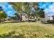 Exterior shot of community buildings with lawn and trees at 3473 Monte Carlo Dr, Las Vegas, NV 89121