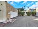 Exterior view of a garage with well-maintained landscaping at 3473 Monte Carlo Dr, Las Vegas, NV 89121