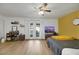 Spacious primary bedroom with French doors, ceiling fan, and a makeup vanity area at 3473 Monte Carlo Dr, Las Vegas, NV 89121