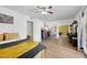 Bright primary bedroom boasts ample space, ceiling fan, and stylish furnishings at 3473 Monte Carlo Dr, Las Vegas, NV 89121