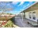 Outdoor patio featuring stone flooring, a covered area, wrought iron railing, and an outdoor lounge space at 3473 Monte Carlo Dr, Las Vegas, NV 89121