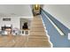 Modern staircase with two-tone design, leading to the upper level at 3473 Monte Carlo Dr, Las Vegas, NV 89121