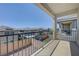 Outdoor balcony with views of nearby homes and blue skies at 365 Andy Wheeler Dr, Henderson, NV 89011