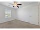 This bedroom offers neutral carpet and a ceiling fan to keep the room nice and cool at 365 Andy Wheeler Dr, Henderson, NV 89011