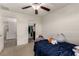 Bedroom featuring a window allowing for natural light and a comfortable bed at 365 Andy Wheeler Dr, Henderson, NV 89011