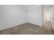 This bedroom offers neutral carpet and a double closet for additional storage at 365 Andy Wheeler Dr, Henderson, NV 89011