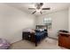 Bedroom featuring a window allowing for natural light and a comfortable bed at 365 Andy Wheeler Dr, Henderson, NV 89011