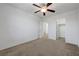 This bedroom offers neutral carpet and a ceiling fan to keep the room nice and cool at 365 Andy Wheeler Dr, Henderson, NV 89011