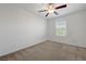 This bedroom offers neutral carpet and a ceiling fan to keep the room nice and cool at 365 Andy Wheeler Dr, Henderson, NV 89011