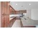Gourmet kitchen featuring granite countertops and stainless steel appliances at 365 Andy Wheeler Dr, Henderson, NV 89011