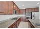 Close up of a kitchen featuring granite countertops and stainless steel appliances at 365 Andy Wheeler Dr, Henderson, NV 89011