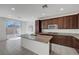 Well-lit kitchen with granite countertops, and stainless steel appliances at 365 Andy Wheeler Dr, Henderson, NV 89011