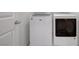 Laundry room featuring a white washing machine and dryer at 365 Andy Wheeler Dr, Henderson, NV 89011