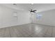 Bright and airy living room featuring tile floors and large windows at 365 Andy Wheeler Dr, Henderson, NV 89011